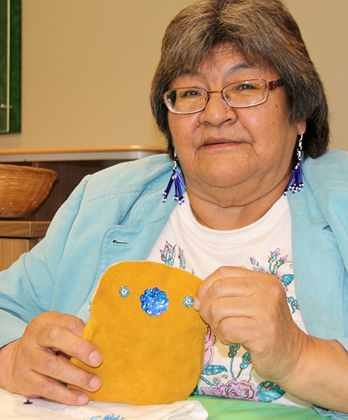 Niska beadwork stitches relationships together