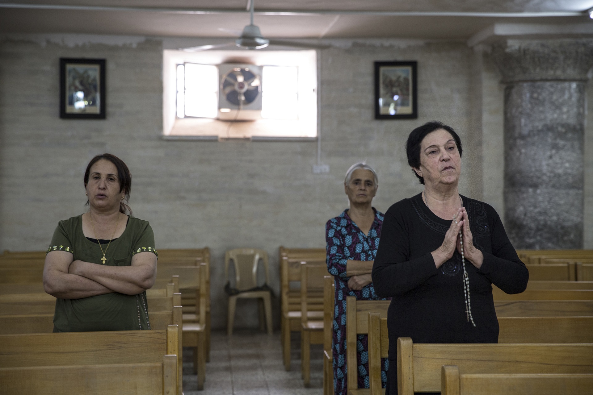 An eerie calm: Iraqi Christians anxiously ponder their future